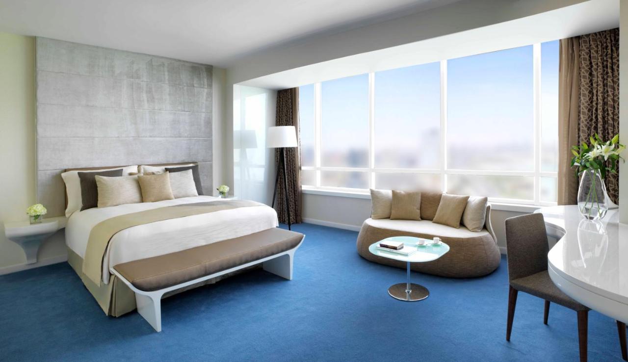 Symphony Style Hotel Kuwait Salmiya Exterior foto A bedroom at the hotel